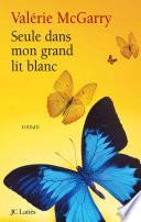 Seule dans mon grand lit blanc